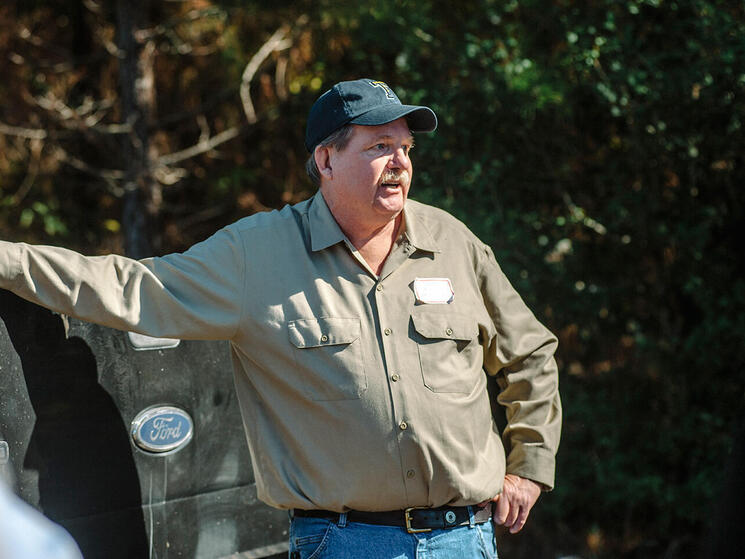 Local FSC certified landowner Dan McWilliams addresses participants of the FSC Landowner Learning Exchange for their presentation at his family property near Ashdown, AR, on Thursday, October 28, 2015.