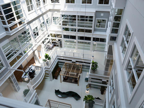 Inside communal lobby space and seating at WWF-US headquarters in Washington, DC.