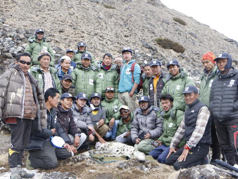 The group that helped to collar the snow leopard.