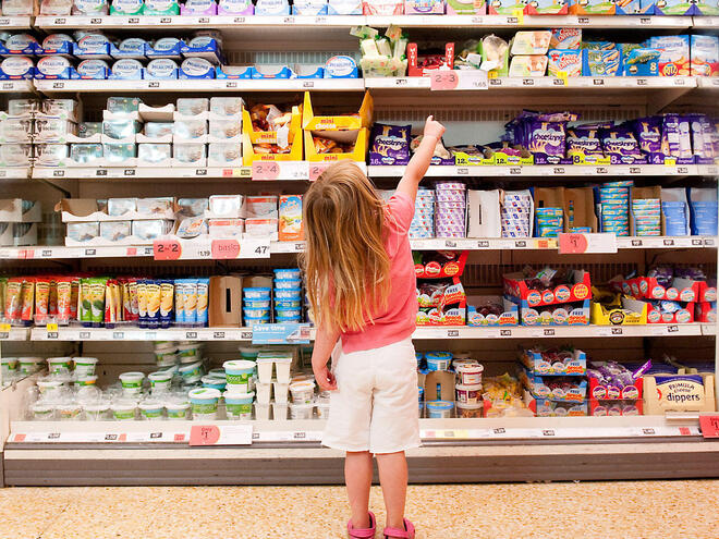 child in grocery store