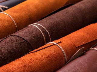 rolls of red and brown leather