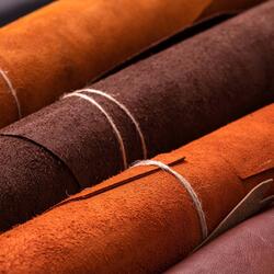 rolls of red and brown leather