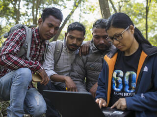 Sabita Malla (front), tiger expert at WWF Nepal, is working with citizen scientists (Santos Tharu, Khakendra Thapa and Chain Kumar) responsible for monitor tigers in the Khata Corridor.