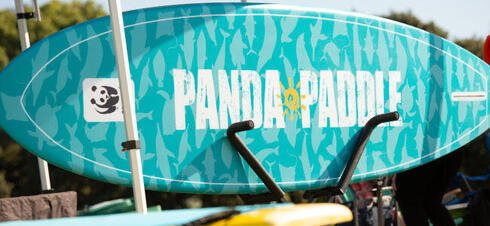 Surfboard with custom Panda Paddle design