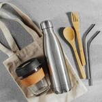 A collection of reusable bags, cups, cutlery