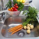 vegetables in a kitchen sink