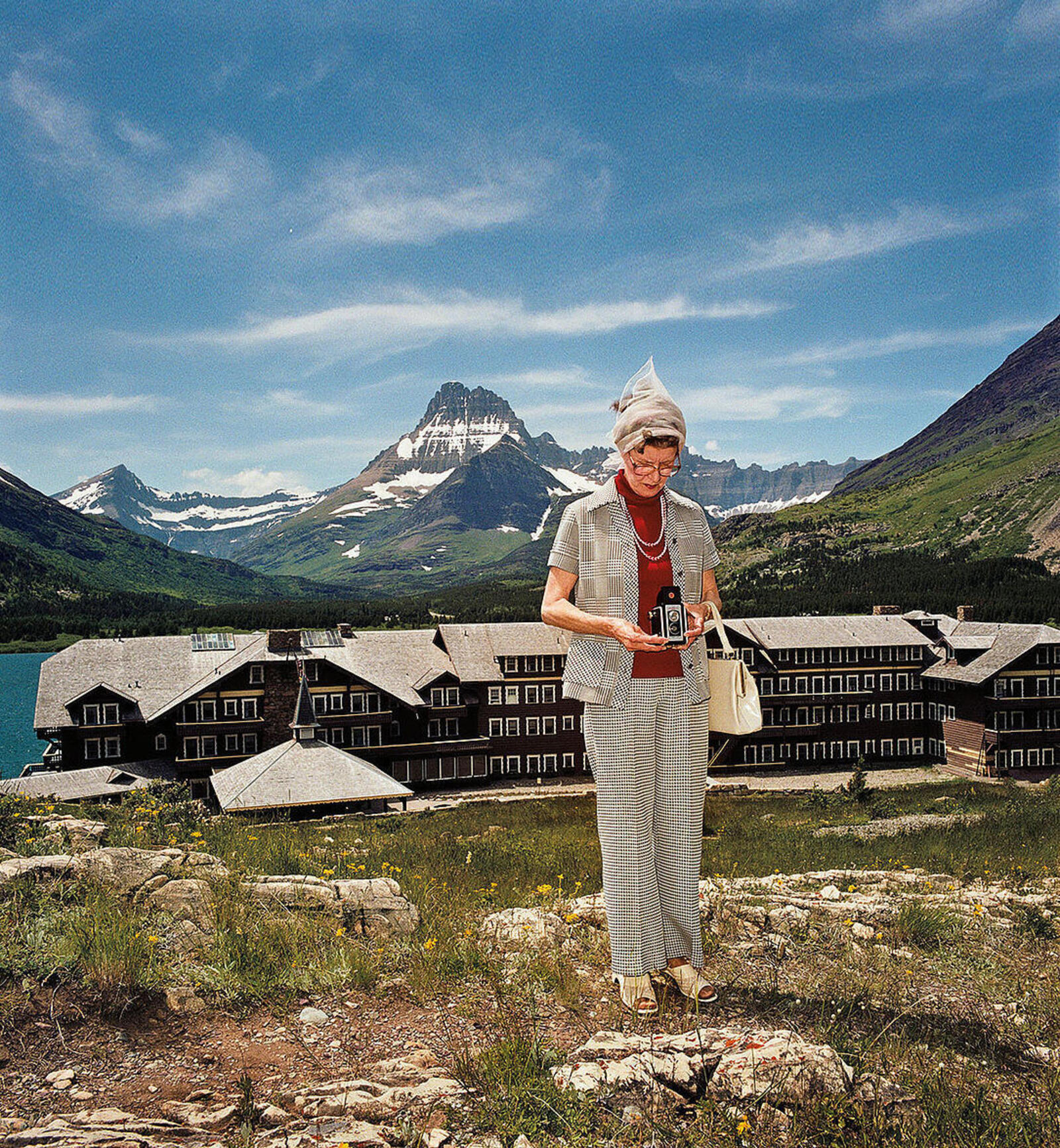 A woman in front of mountains